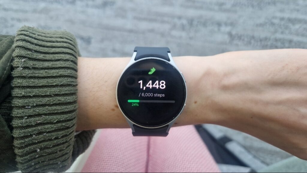 Smartwatch showing daily step count used to track movement during a fat loss phase.